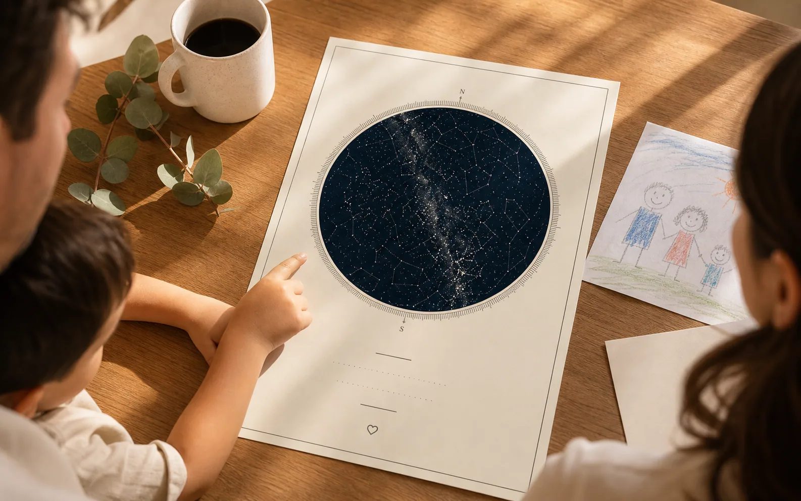 Family looking at a custom star map print for Dad on a warm timber table